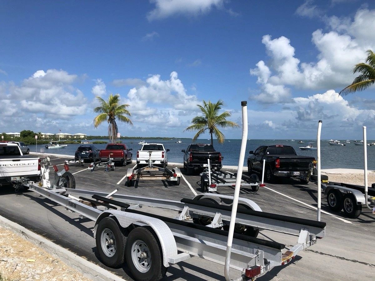 Boat trailers lined up at a Southwest Florida boat ramp